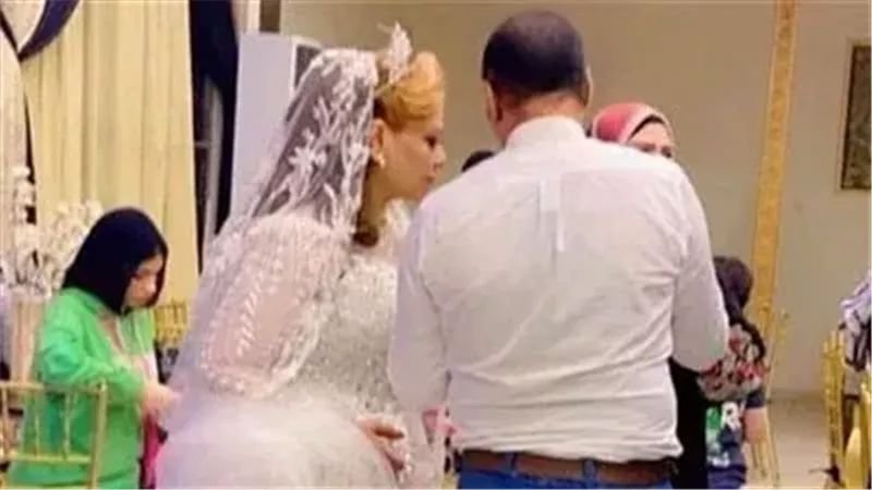أم العريس بالفستان