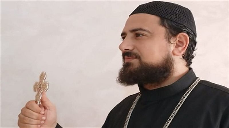 قس