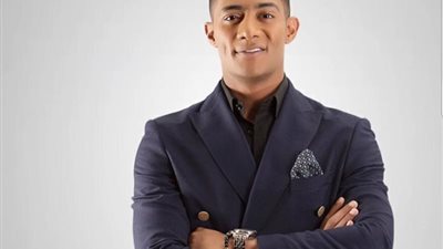 الفنان محمد رمضان يعترف ان له اخا مسيحيا يدعي روماني ..فاليكم التفاصيل