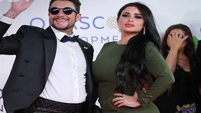 بالصور زوجة أحمد الفيشاوي تشعل الانترنت من جديد بملابس مثيره علي شاطئ الجونه