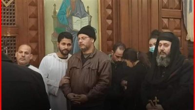 صوره بالف معني يلتقطها الصحفي نادر شكري لعائله الشهيد مينا عبد السيد