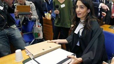 امل علم الدين ترغب في محاكمه الرئيس السوري بشار الاسد معلنه سعادتها عند وضعه في قفص الاتهام