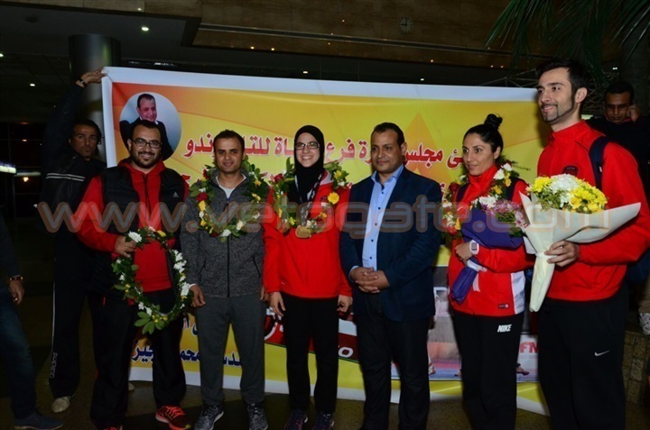 بالصور وصول هداية ملاك لاعبة التايكوندو لمطار القاهرة بعد تأهلها للأولمبياد